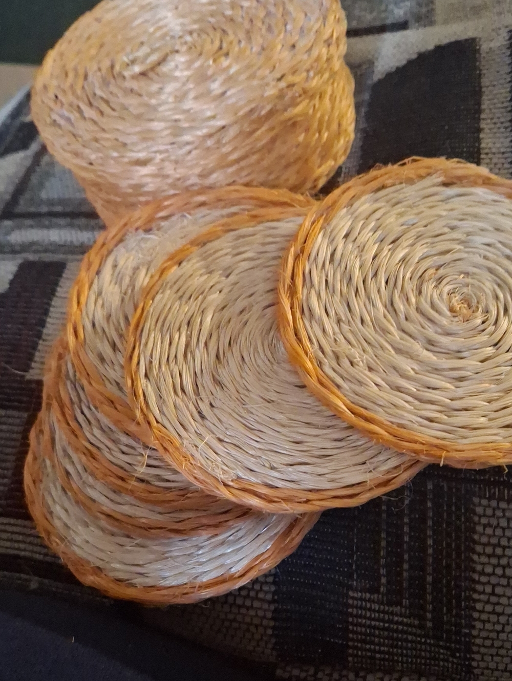 Handwoven Natural Straw Coasters with Orange Trim Set of 6 In Basket